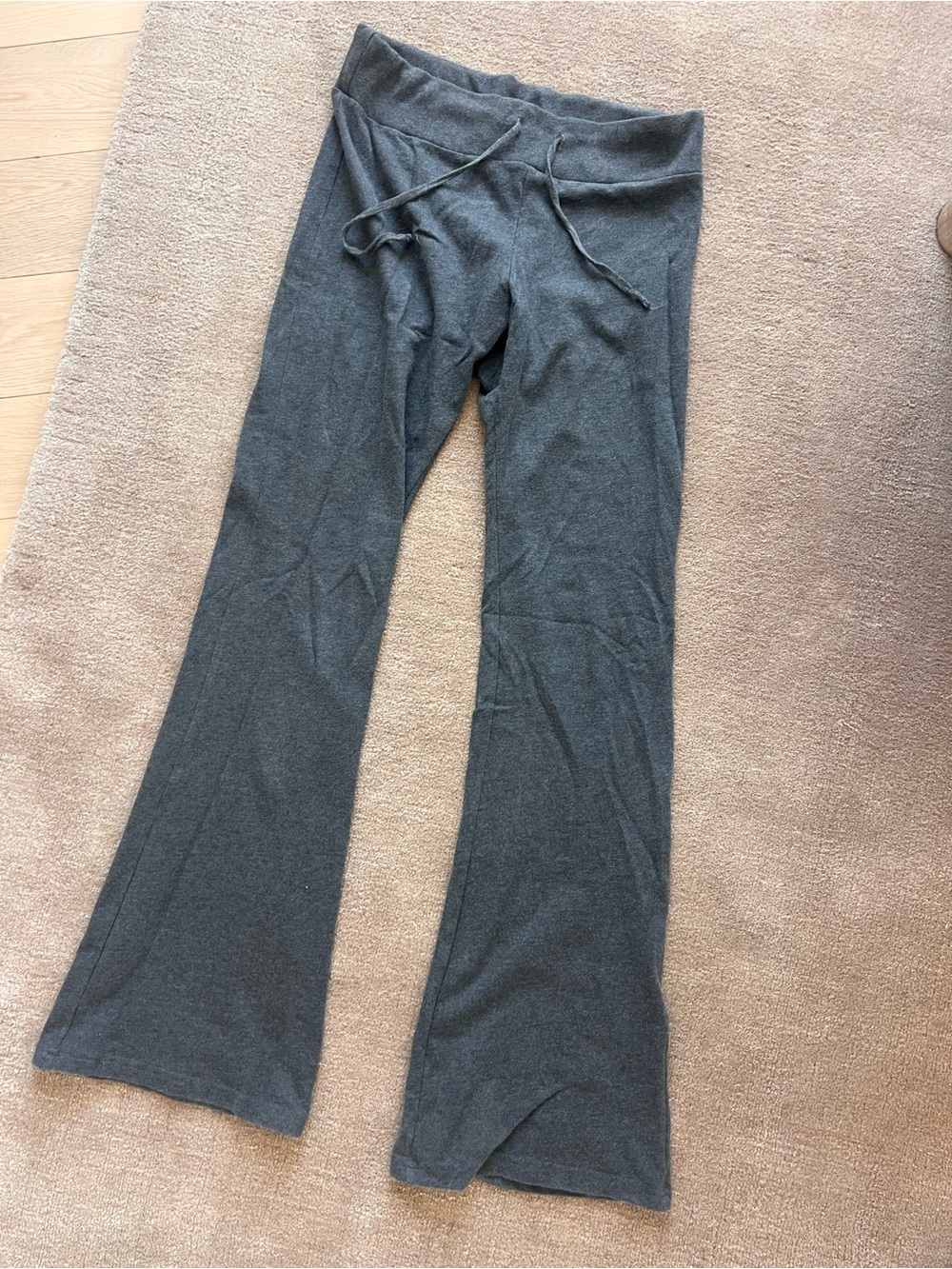 Brandy Melville grey drawstring flair pants.